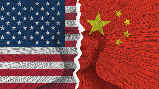 U.S. and China flags torn apart in a digital circuitry style, symbolizing AI and geopolitical competition.